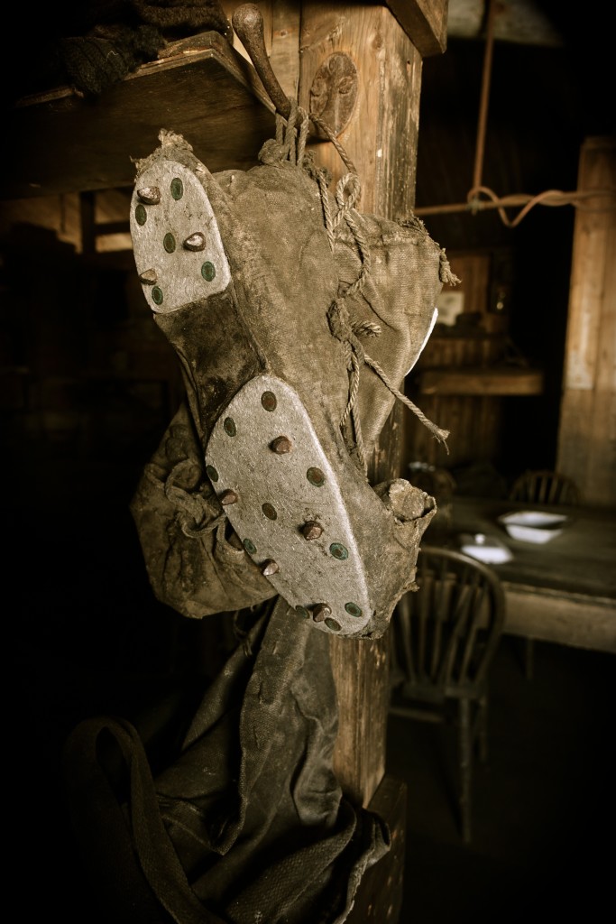 Canvas boots hanging on the bunk corner post in Scott's Terra Nova hut